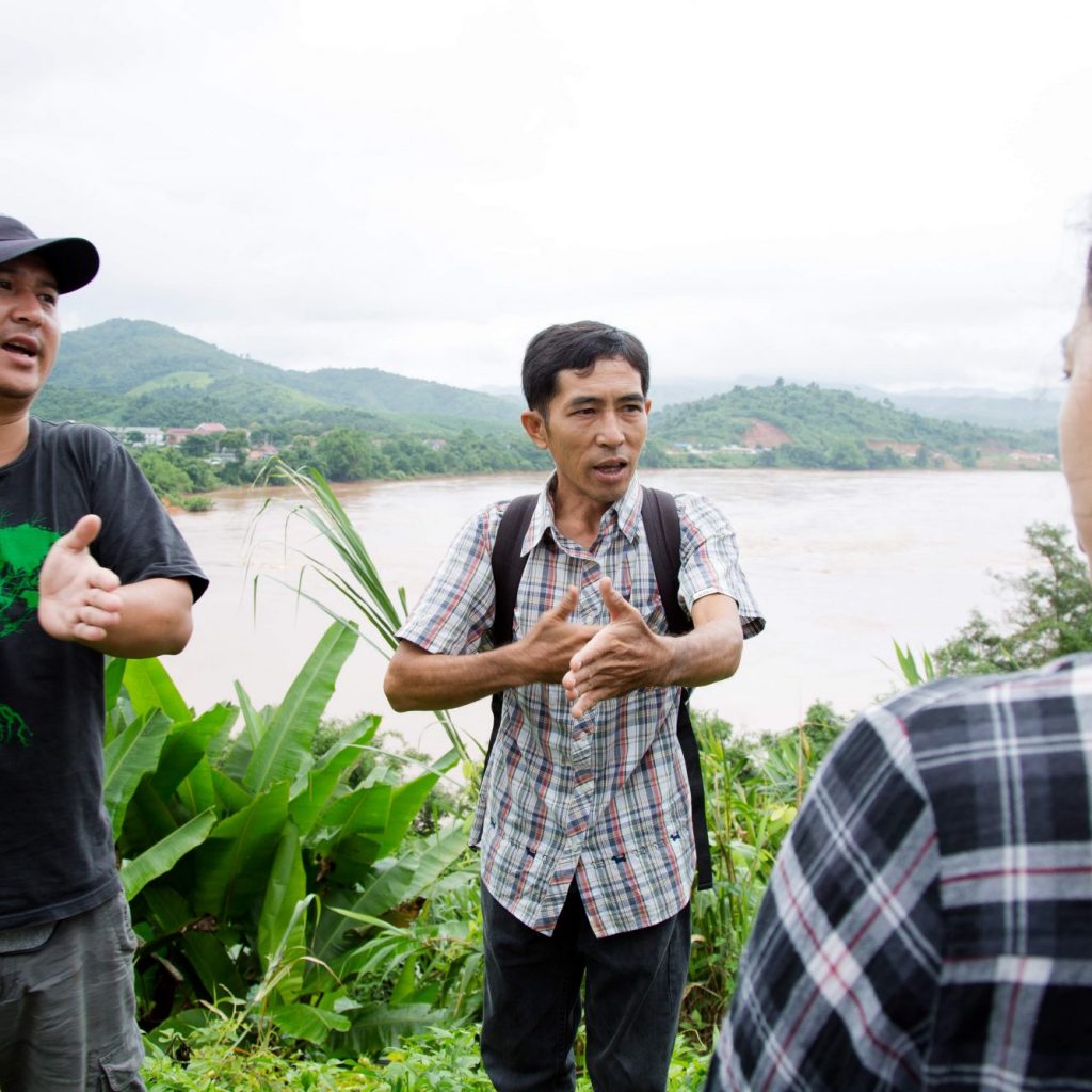 Jeerasak Inthayod, a member of Rak Chiang Khong, and Neung, ERI Mekong Legal Associate, explains how the Khon Pi Luang rapid is very important for local people’s livelihoods. Jeerasak described how Khon Pi Luang marks a narrow section of the Mekong River, well-known among local fishermen as a place where giant catfish lay their eggs. In dry season, local people collect kai – an eatable river weed that provides a vital source of income for many families.