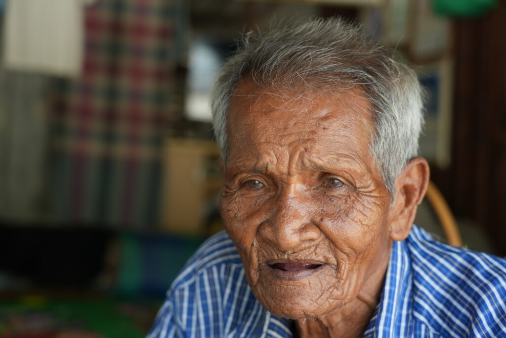 83-year old community leader Noi.