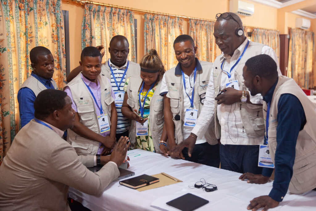 Participants ask follow up questions of Erick Kassongo after his session on Connecting the Law and Advocacy. 