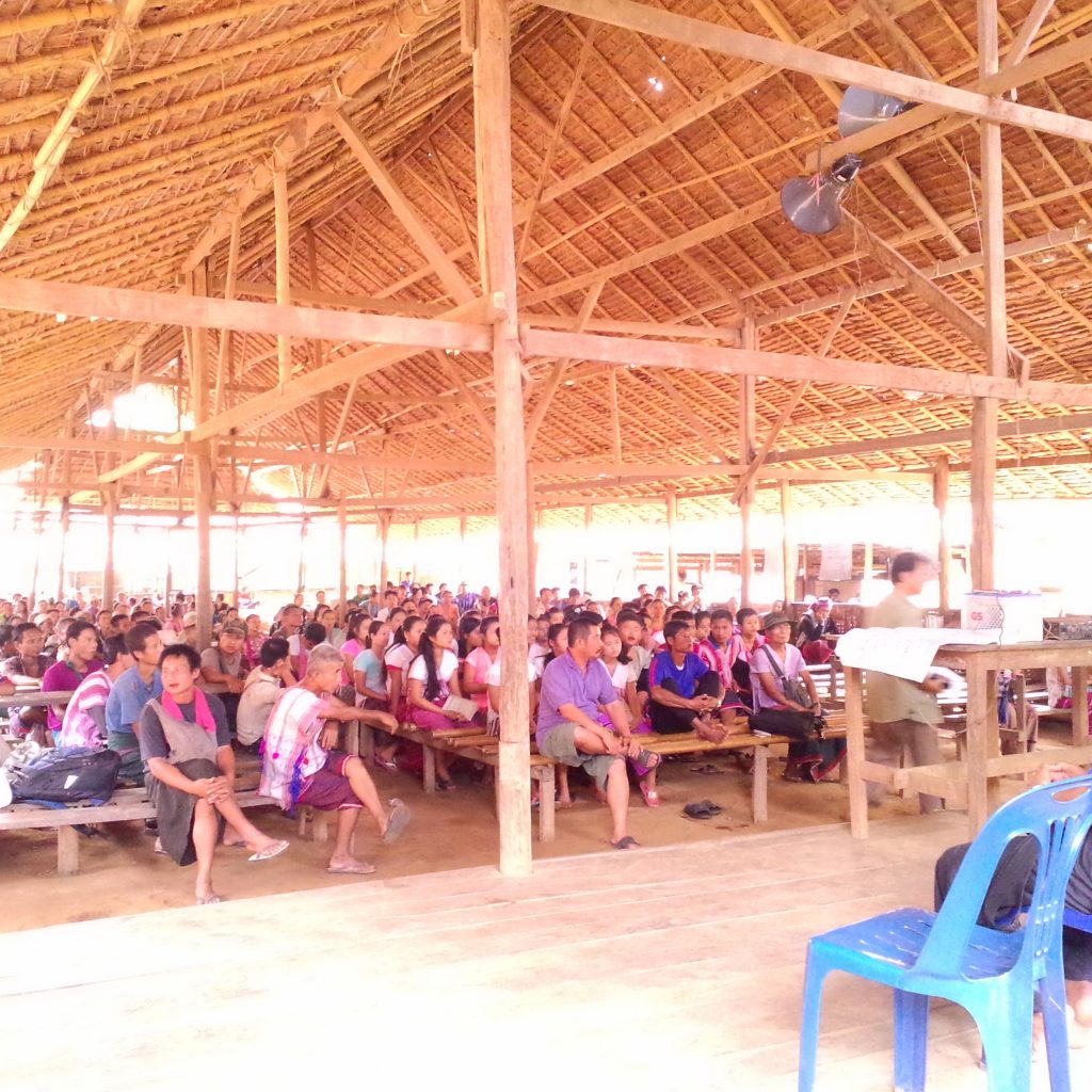 A community in Myanmar meets to discuss the impacts of the dam.