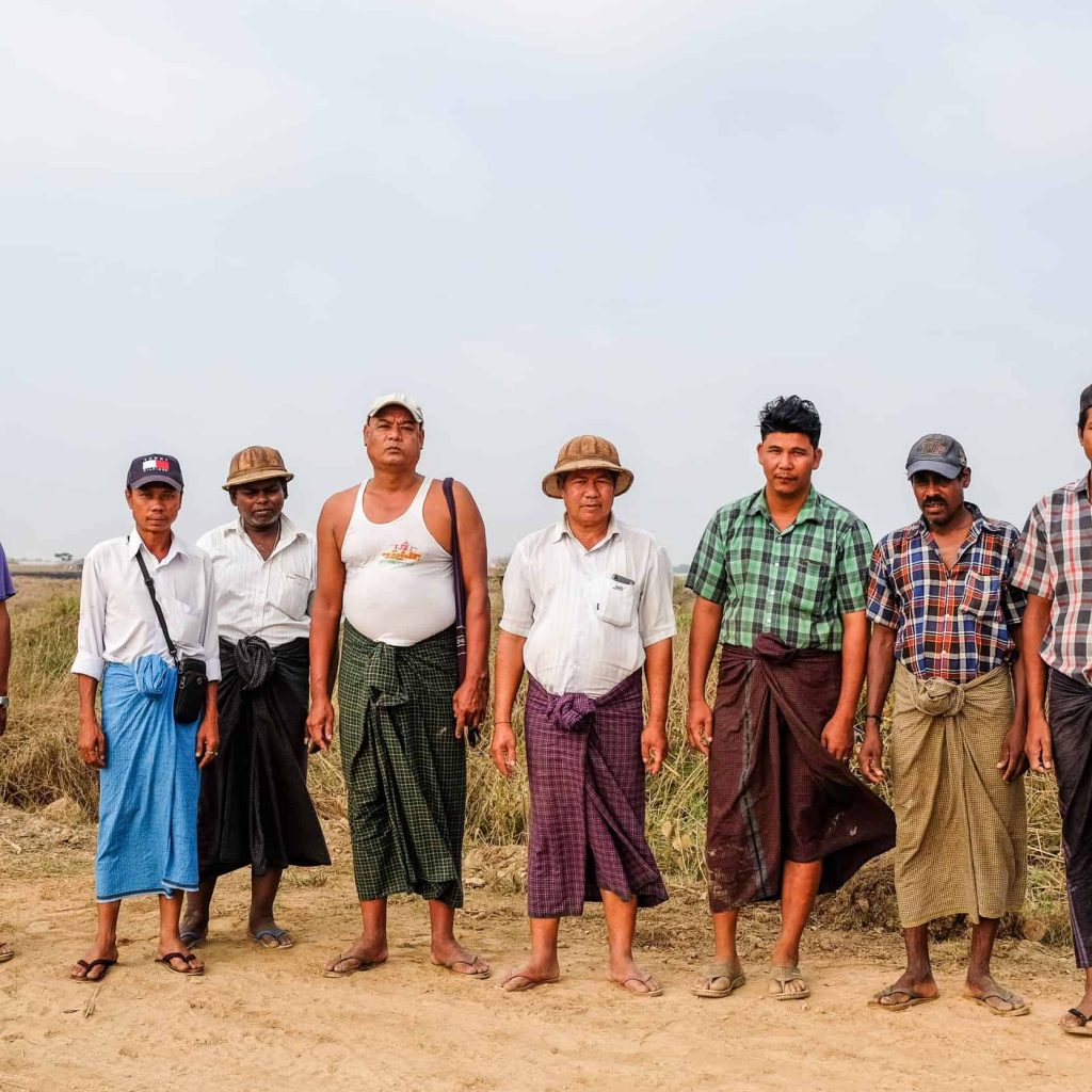 A group of the 33 farmers on their land near Thilawa Special Econoimc Zone in Myanmar.