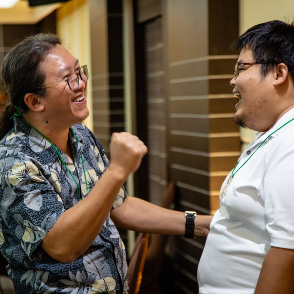Paul Sein Twa from the Karen Environmental and Social Action Network talks with Tom Weerachat from International Accountability Project. The Forest Defenders Conference also helped activists who are engaged in a broad range of issues to focus specifically on strategies to protect and support earth rights defenders.
