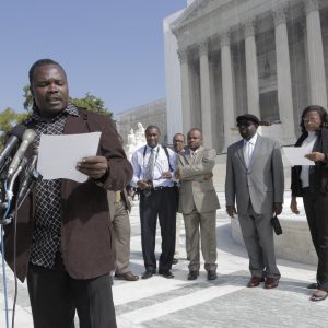 Plaintiff Charles Wiwa speaks with press outside the US Supreme Court