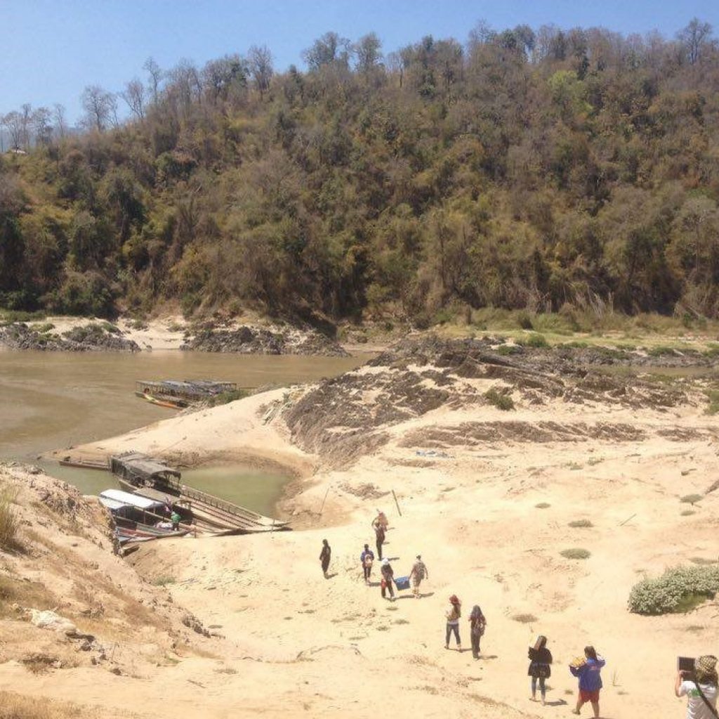Communities on Thai side of the river travel to Ei Tu Tha village in Myanmar.