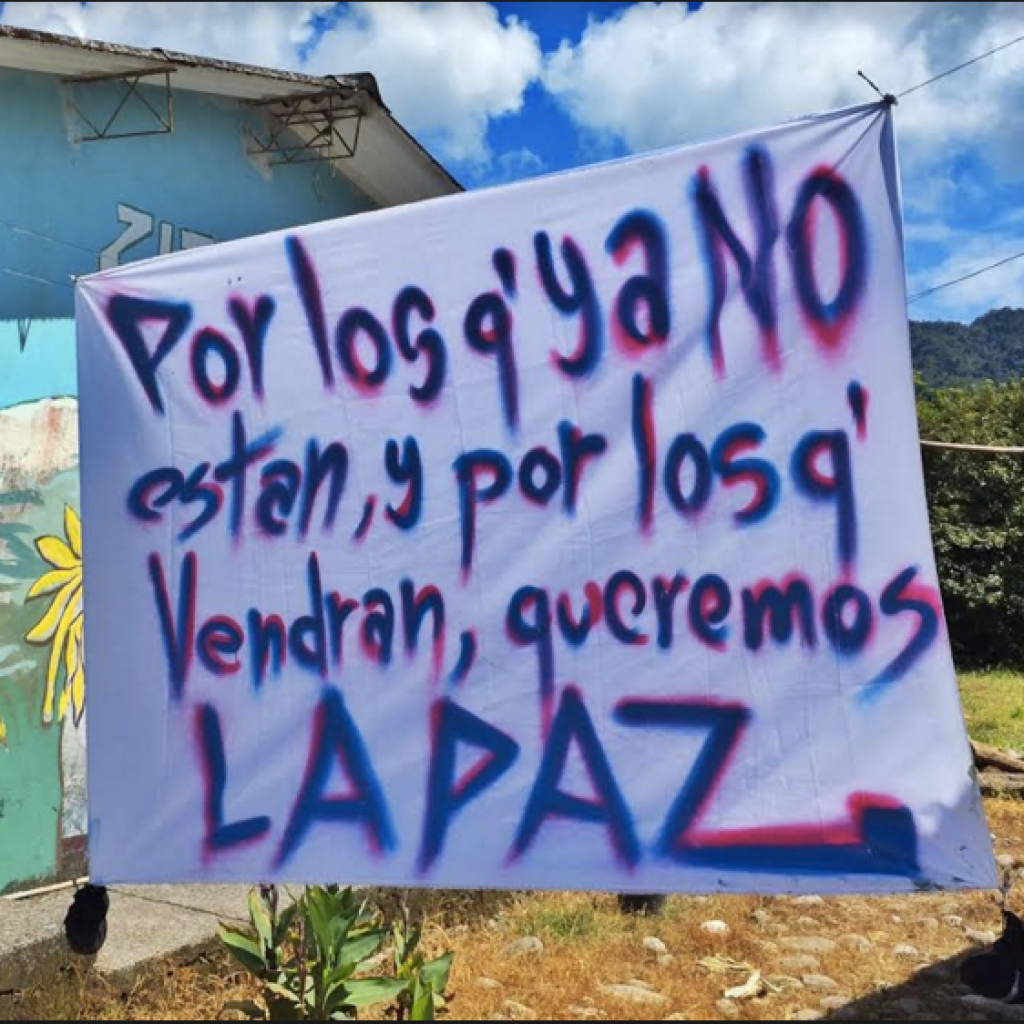 A sign in the U’wa village: “For those who are no longer here, for those who will come, we want peace”